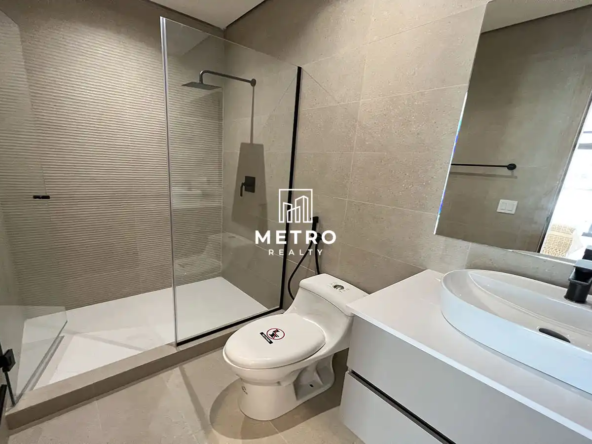 Nogal Panama Pre Construction Condos Costa del Este bathroom mirror, toilet, and shower view