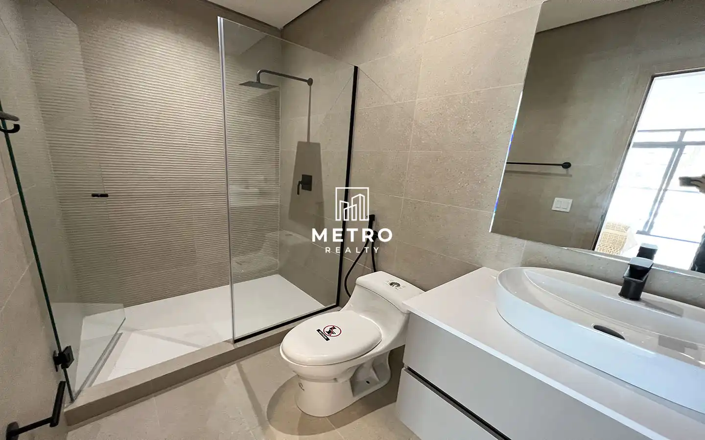 Nogal Panama Pre Construction Condos Costa del Este bathroom mirror, toilet, and shower view