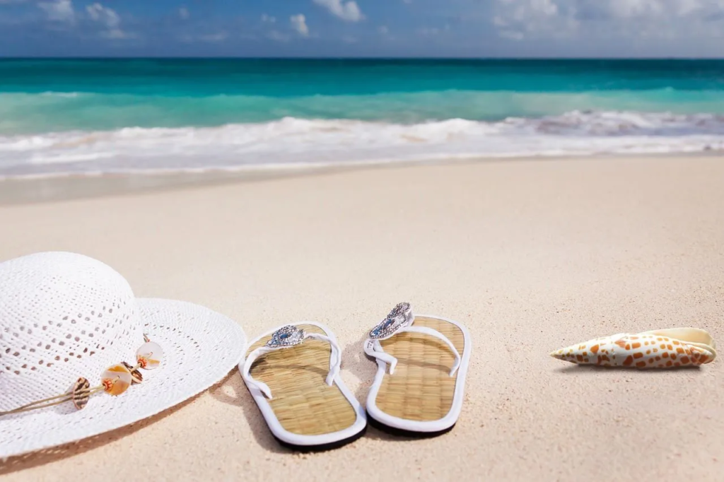 Panama Retirement Communities shoes and hat on beach