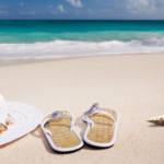 Panama Retirement Communities shoes and hat on beach