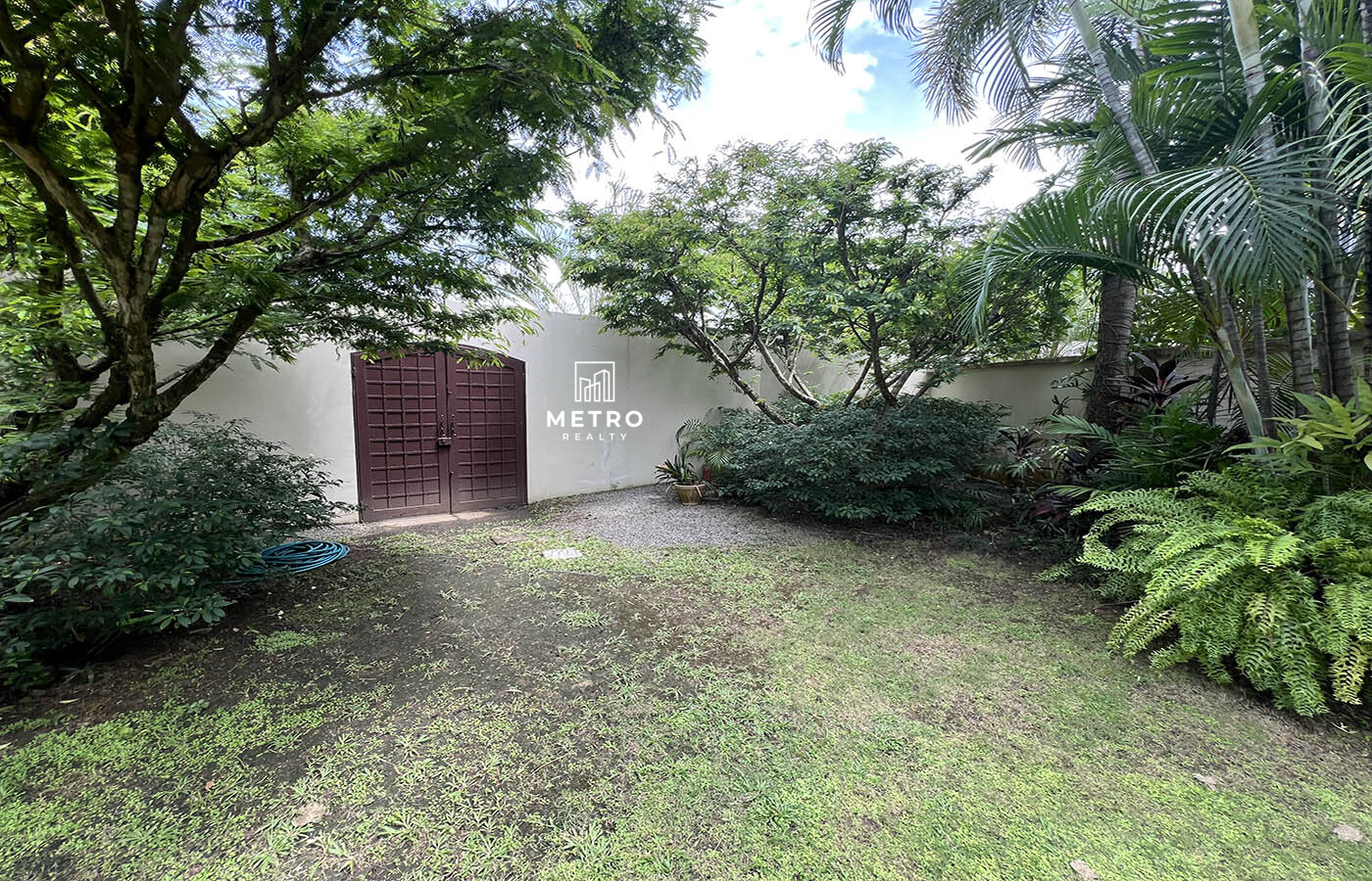 Costa del Este Panama Homes for Sale Garden with Door